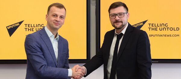 Первый заместитель главного редактора МИА Россия сегодня Сергей Кочетков и директор по коммуникациям и PR фонда Дирекция II Европейских игр 2019 года Алексей Богданович Первый заместитель главного редактора МИА Россия сегодня Сергей Кочетков и директор по коммуникациям и PR фонда Дирекция II Европейских игр 2019 года Алексей Богданович - Sputnik Грузия