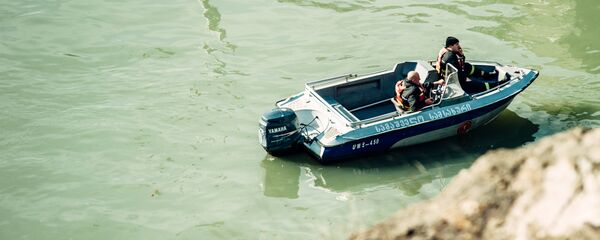 Спасательная служба ведет поиски на реке Кура. Архивное фото - Sputnik Грузия