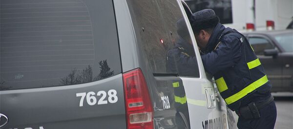 Сотрудник патрульной полиции - Sputnik Грузия