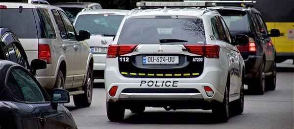 Машина патрульной полиции на улице Цинцадзе - Sputnik Грузия