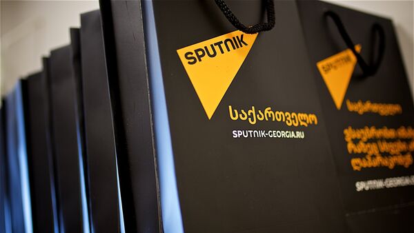 Фирменные пакеты Sputnik с логотипом агентства - Sputnik Грузия
