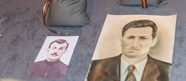 Семьи погибших в годы ВОВ грузин получили землю с братской могилы в Орле - Sputnik Грузия