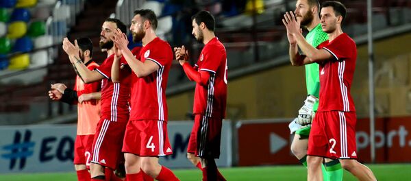 Игроки сборной Грузии после победы над командой Эстонии - Sputnik Грузия