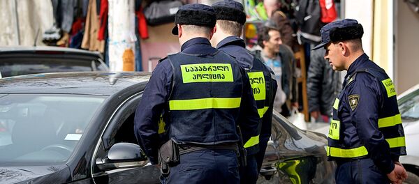 Сотрудники патрульной полиции - Sputnik Грузия