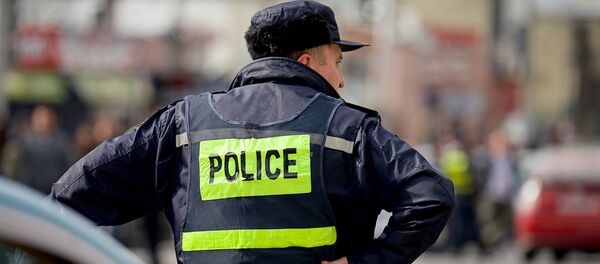 Сотрудник патрульной полиции - Sputnik Грузия