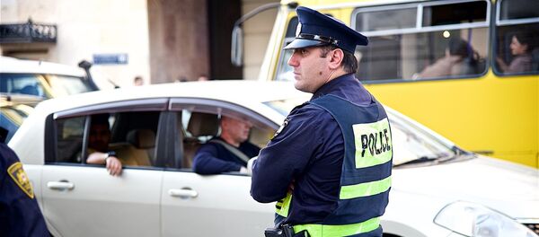 Сотрудник патрульной полиции - Sputnik Грузия