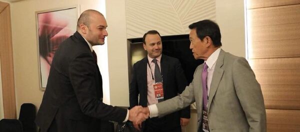 Вице-премьер Японии Таро Асо и министр финансов Грузии Мамука Бахтадзе Вице-премьер Японии Таро Асо и министр финансов Грузии Мамука Бахтадзе - Sputnik Грузия