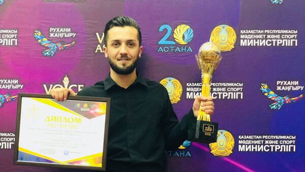 Грузинский певец Авто Абесламидзе выиграл Международный музыкальный конкурс Voice of Astana - Sputnik Грузия