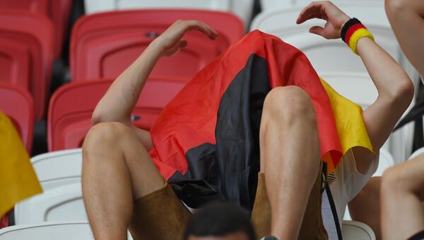Болельщик сборной Германии после окончания матча группового этапа чемпионата мира по футболу между сборными Республики Корея и Германии - Sputnik Грузия
