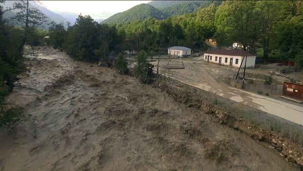 Наводнение в Сванетии: кадры разбушевавшейся реки Ненскра с дрона - Sputnik Грузия