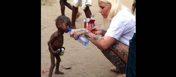 Нигерийского малыша бросили родители – история его спасения на видео - Sputnik Грузия
