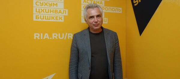 Первый заместитель декана факультета мировой экономики и мировой политики ВШЭ Игорь Ковалев - Sputnik Грузия