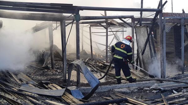 За последние несколько лет это уже не первый пожар на строительном рынке Элиава - Sputnik Грузия