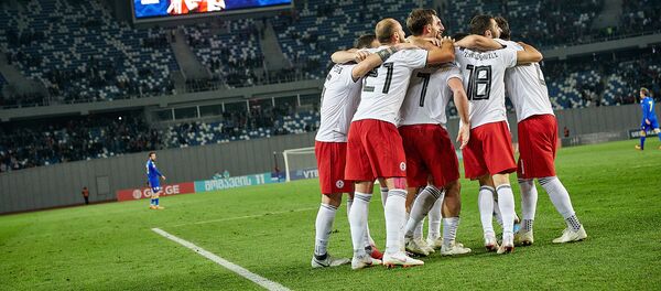 Матч между сборными Грузии и Андорры по футболу -  грузинские игроки празднуют третий забитый гол - Sputnik Грузия