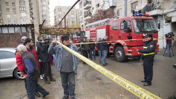 Пожарные и полиция на месте взрыва в жилом доме в Поничала - Sputnik Грузия
