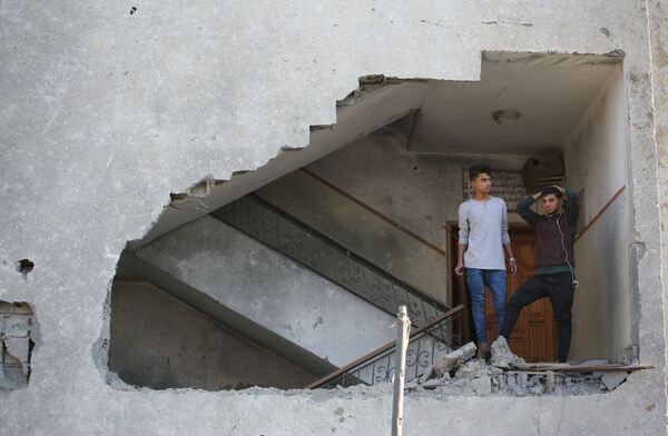 ისრაელის რაკეტებით დაზიანებული სახლი ღაზის სექტორში - Sputnik საქართველო