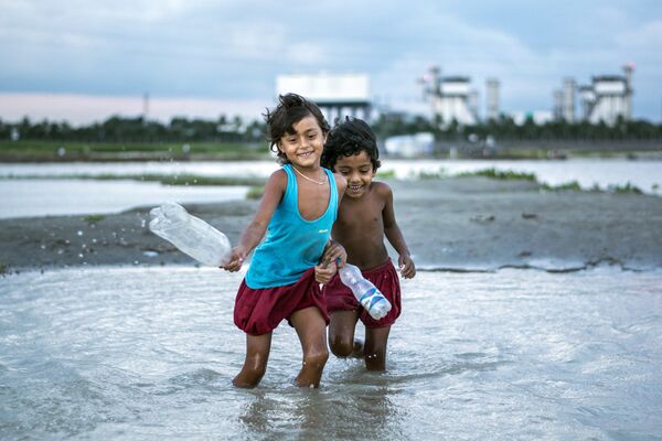 Снимок бангладешского фотографа Фардина Ояна, победивший в категории Young tpoty age 15-18 ( Молодой возраст 15-18) конкурса Travel Photographer of the Year 2018  - Sputnik Грузия