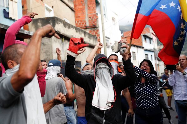 Лидер оппозиции и глава парламента Венесуэлы Хуан Гуаидо призвал всех жителей страны выйти на улицы и поддержать антиправительственные выступления - Sputnik Грузия