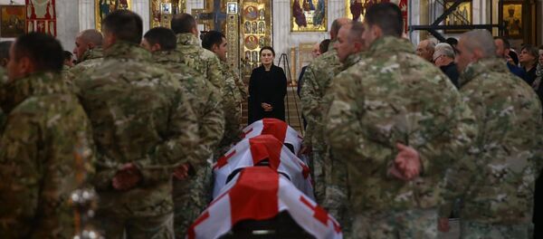 აფხაზეთის ომში დაღუპულთა სულების მოსახსენიებელი პანაშვიდი აფხაზეთის ომში დაღუპულთა სულების მოსახსენიებელი პანაშვიდი - Sputnik საქართველო