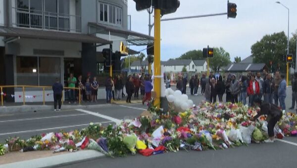 Трагедия в Новой Зеландии - цветы и свечи в память о погибших - Sputnik Грузия
