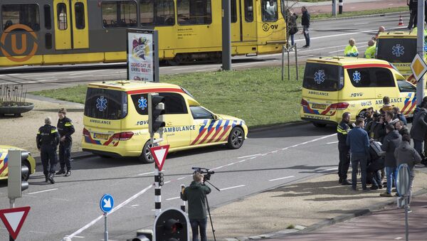 Машины Скорой помощи на месте теракта в городе Утрехт в Нидерландах - Sputnik Грузия