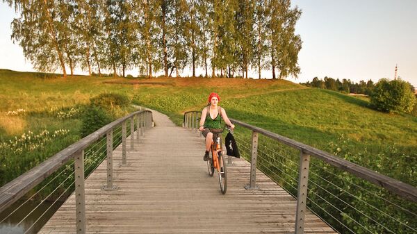 Девушка на велосипеде, Финляндия - Sputnik Грузия