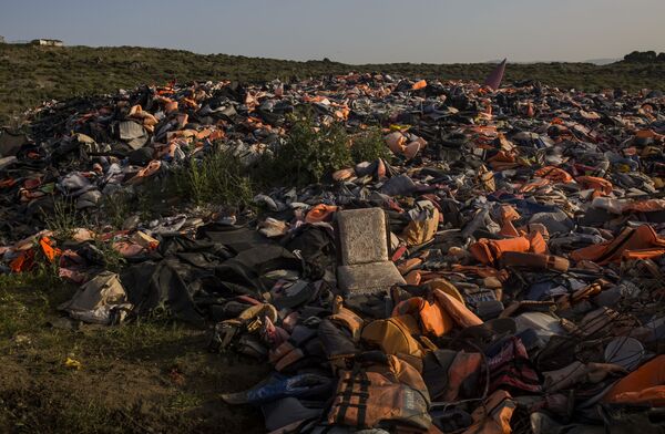 Под давлением правозащитников власти приступили к расселению мигрантов - Sputnik Грузия