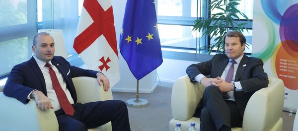 Премьер Грузии Мамука Бахтадзе и вице-президент ЕБРР Юрген Ригтеринк Премьер Грузии Мамука Бахтадзе и вице-президент ЕБРР Юрген Ригтеринк - Sputnik Грузия