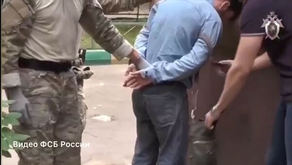Двое подозреваемых в спонсировании террористов задержаны в Москве - Sputnik Грузия