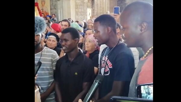 აფროამერიკელები ვლაქერნობის დღესასწაულზე ქართულად გალობენ - Sputnik საქართველო