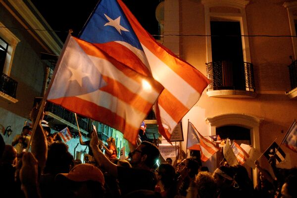 Шестой день подряд в Пуэрто-Рико не утихают массовые протесты  - Sputnik Грузия