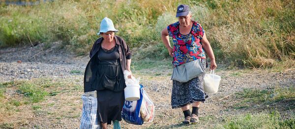 სიმინდის გამყიდვლები პლაჟზე სიმინდის გამყიდვლები პლაჟზე - Sputnik საქართველო