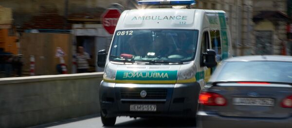 Бригада врачей Скорой помощи едет по вызову - Sputnik Грузия