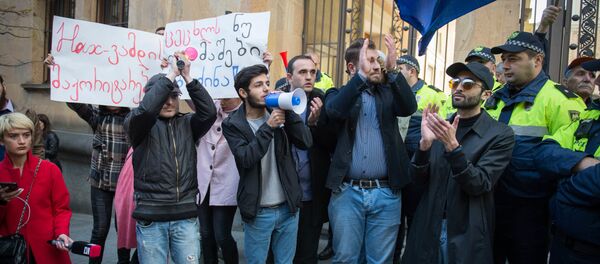 Молодежная акция протеста с требованием принять законо об изменении избирательной системы Молодежная акция протеста с требованием принять законо об изменении избирательной системы - Sputnik Грузия
