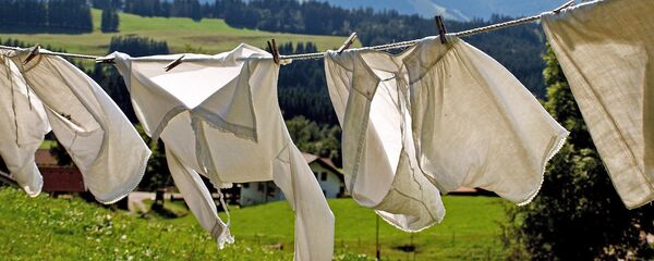 გასაშრობად გაფენილი ტანსაცმელი გასაშრობად გაფენილი ტანსაცმელი - Sputnik საქართველო