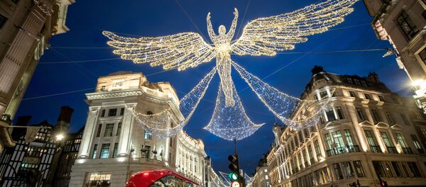 Рождественские украшения на Риджент-стрит в Лондоне Рождественские украшения на Риджент-стрит в Лондоне - Sputnik Грузия