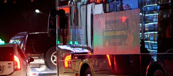 Зеленый пассажирский автобус MAN Зеленый пассажирский автобус MAN - Sputnik Грузия