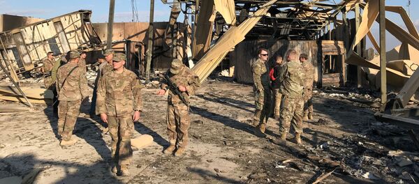 Последствия ракетного удара по авиа базе Айн аль-Асад на западе Ирака - Sputnik Грузия