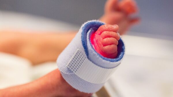 Ножки новорожденного ребенка - Sputnik Грузия