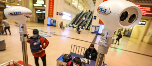 კორონავირუსის სკრინინგი უხანის აეროპორტში კორონავირუსის სკრინინგი უხანის აეროპორტში - Sputnik საქართველო