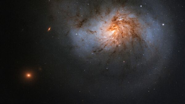 Спиральная галактика с перемычкой NGC 1022 в созвездии Кит - Sputnik Грузия