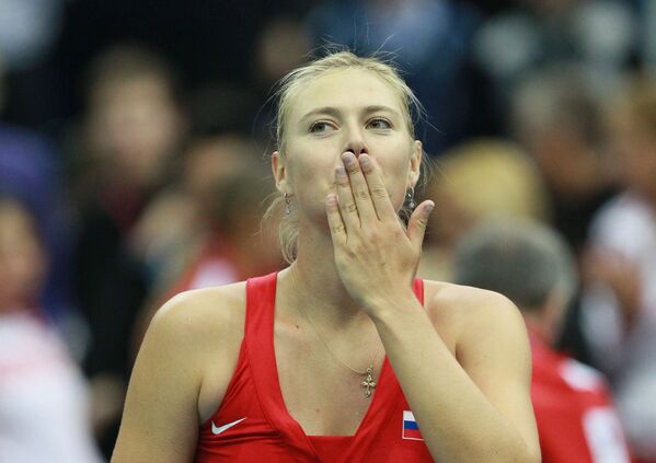 В январе этого года Шарапова одержала победу над прошлогодней победительницей Открытого чемпионата Австралии датчанкой Каролиной Возняцки - Sputnik Грузия