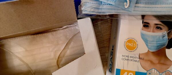 Упаковка медицинских масок Упаковка медицинских масок - Sputnik Грузия