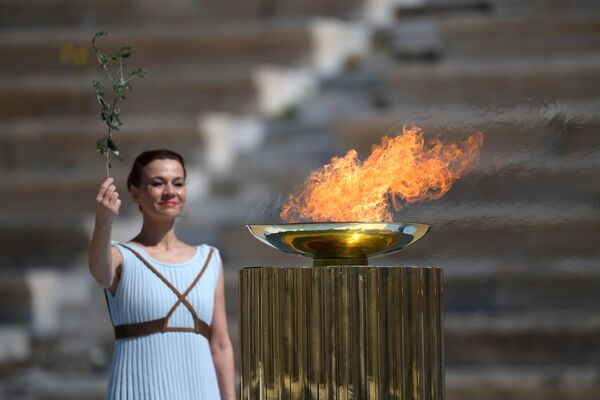  Греция передала олимпийский огонь оргкомитету XXXII Летних Олимпийских игр Токио-2020 - Sputnik Грузия