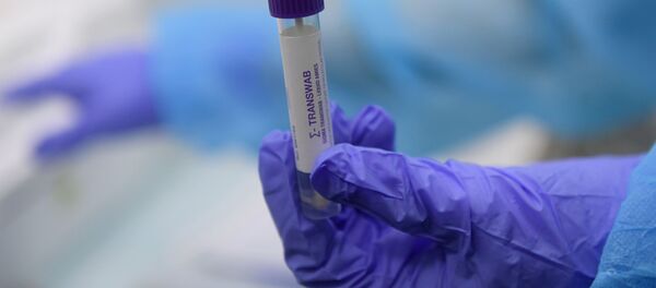 Пробирка с тестом на коронавирус в медицинской лаборатории в Москве - Sputnik Грузия