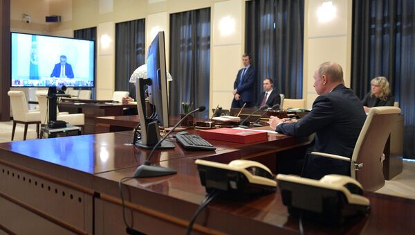 Президент РФ В. Путин принял участие в саммите лидеров Большой двадцатки по коронавирусу в режиме видеоконференции - Sputnik Грузия