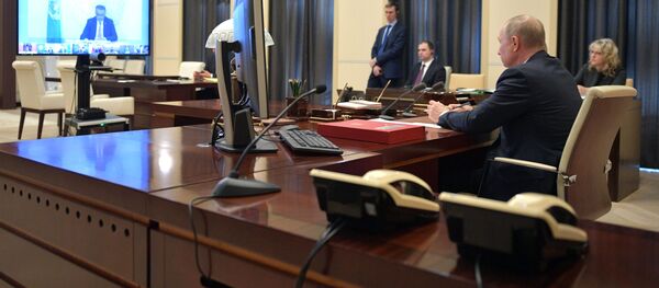 Президент РФ В. Путин принял участие в саммите лидеров Большой двадцатки по коронавирусу в режиме видеоконференции - Sputnik Грузия