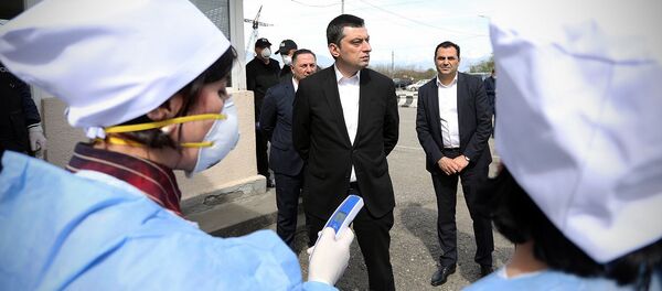 Премьер-министр Грузии Георгий Гахария на блокпосту грузинской полиции на реке Ингури Премьер-министр Грузии Георгий Гахария на блокпосту грузинской полиции на реке Ингури - Sputnik Грузия