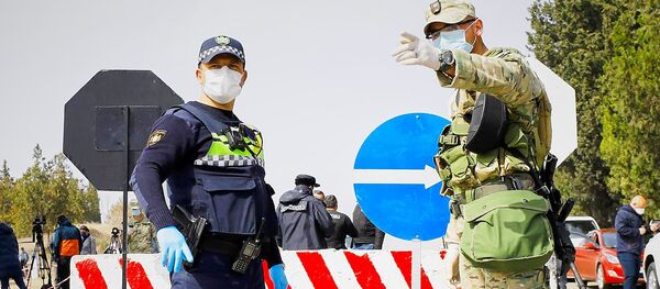პოლიციელები და სამხედროები მარნეულის ბლოკპოსტზე პოლიციელები და სამხედროები მარნეულის ბლოკპოსტზე - Sputnik საქართველო