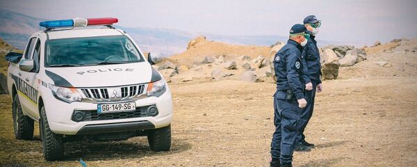Сотрудники региональной патрульной полиции. Полицейский пикап. Марнеули Сотрудники региональной патрульной полиции. Полицейский пикап. Марнеули - Sputnik Грузия